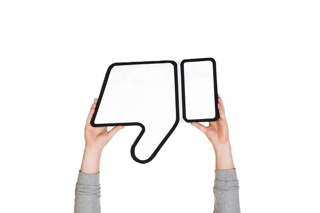 Hands holding the sign of dislike on white studio background.