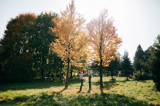 Free photo happy family play in forest