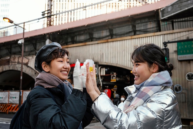 Free photo happy friends spending time together outside