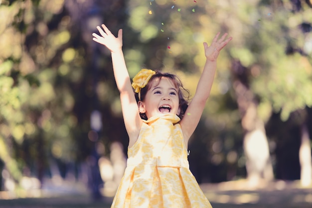 Free photo happy girl laughing in the park