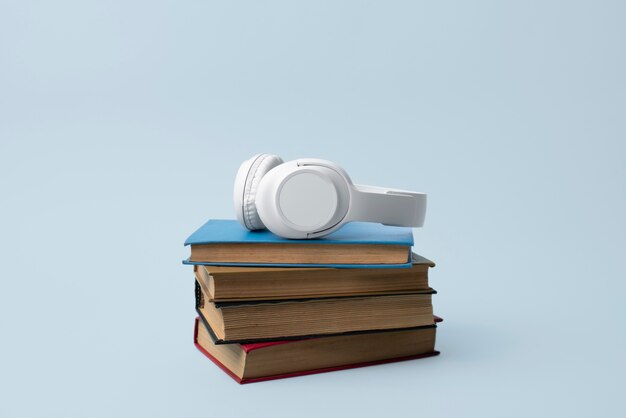 Headphones and books assortment