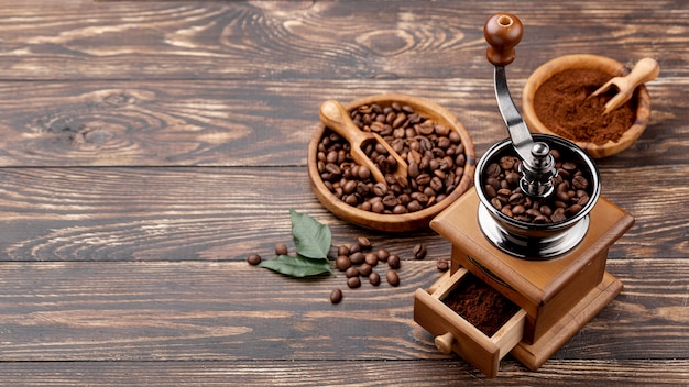 Free photo high angle of coffee concept on wooden table