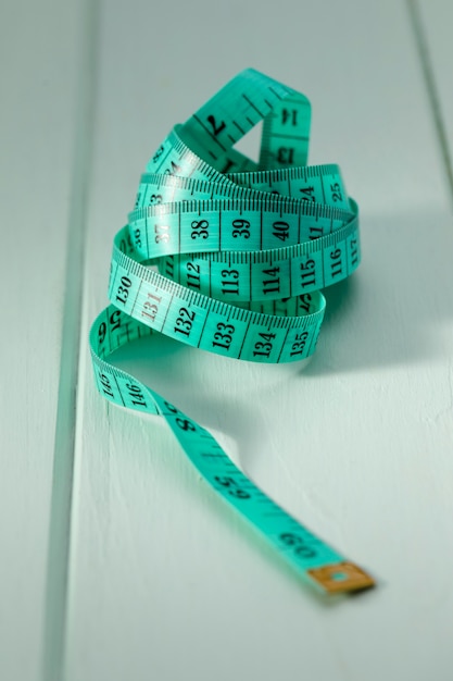 Free Photo high angle of green measuring tape