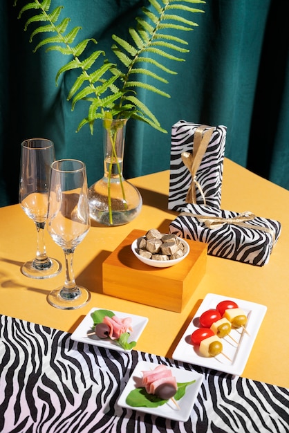 Free photo high angle safari party with snacks arrangement