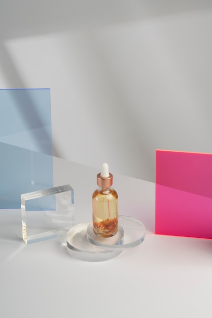 Free Photo high angle serum bottle still life