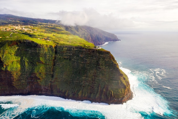 High angle shot of the beautiful cliffs by the ocean