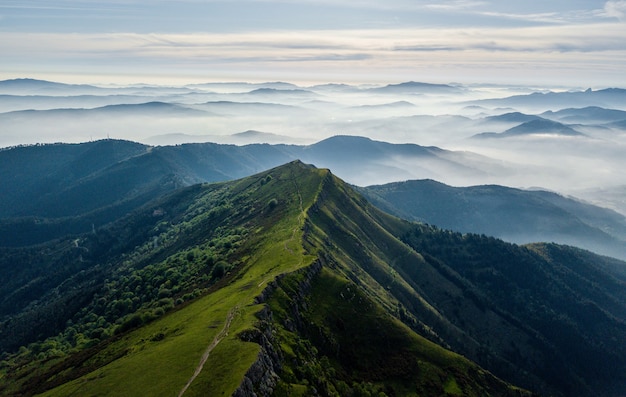 Free Photo high angle shot of foggy hills