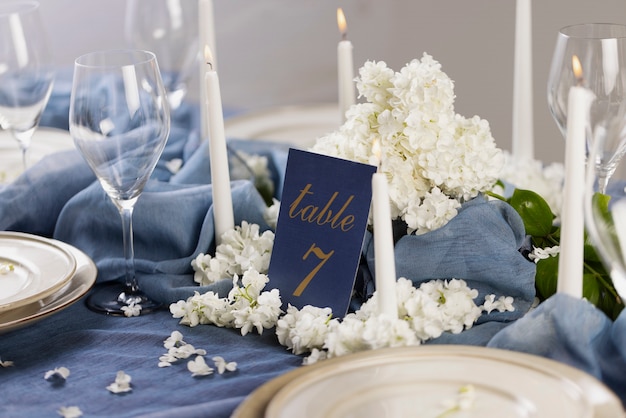 Free photo high angle wedding table number still life