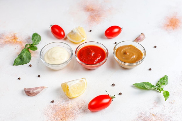 Free photo homemade ketchup,mustard and mayonnaise sauce.