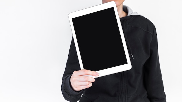 Free photo human hand with digital tablet showing blank black screen