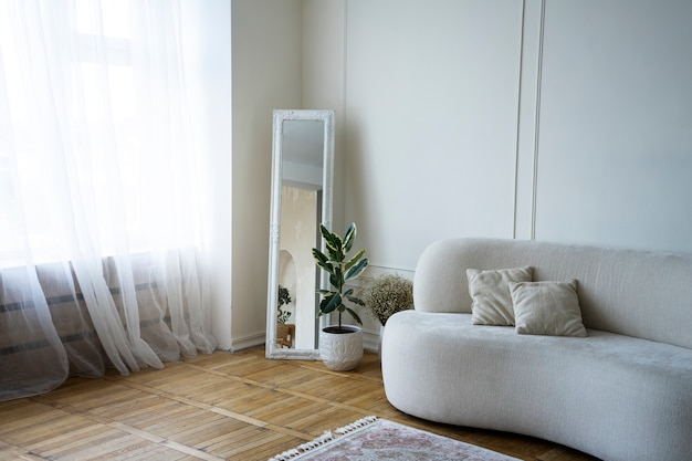 Free photo interior decor with mirror and potted plant