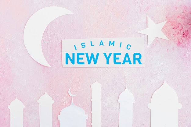 Free photo islamic new year words and mosque silhouette