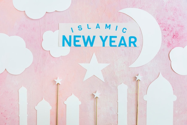 Free photo islamic new year words with paper decor