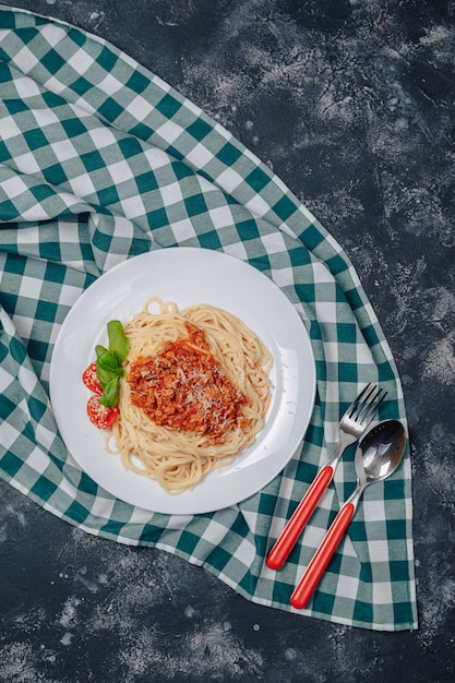 Italian pasta with meat on plate