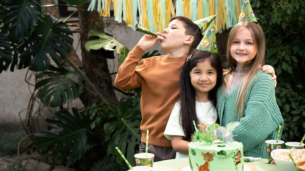 Free photo kids having fun at jungle themed party