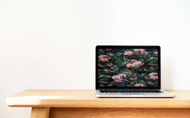 Laptop on a wooden table