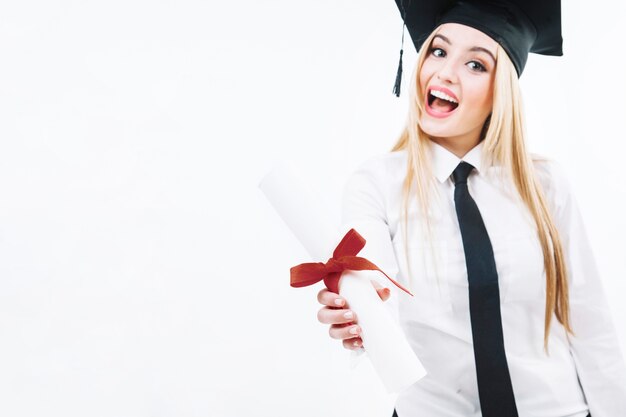 Laughing woman with graduate paper