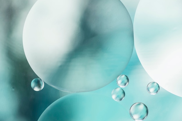 Free photo light blue abstract background with bubbles