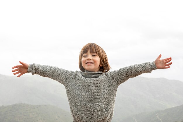 Little boy with arms opened