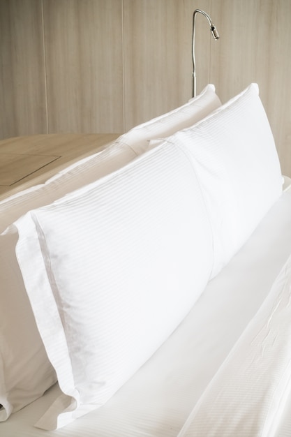 Free Photo long white pillow in a double bed