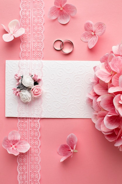 Free Photo luxury wedding concept pink flowers and wedding rings