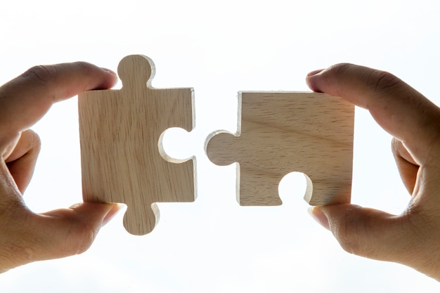 Free Photo macro shot of jigsaw puzzles teamwork concept