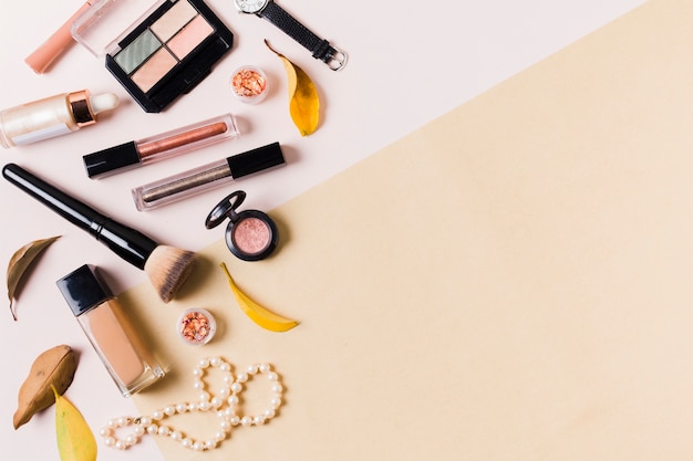 Free photo makeup products on light surface