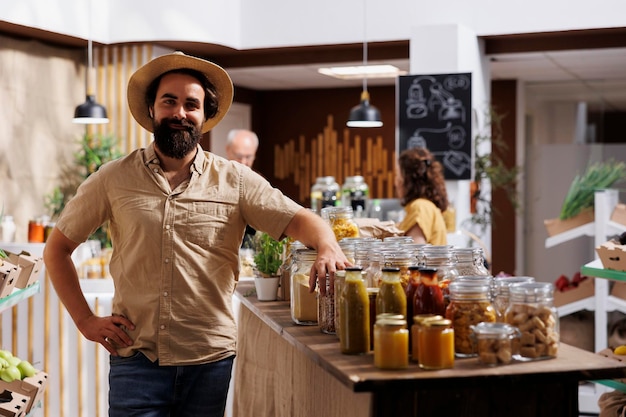 Free photo man buying fresh vegetables in store