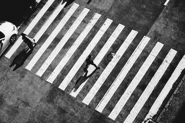 Free photo man crossing street