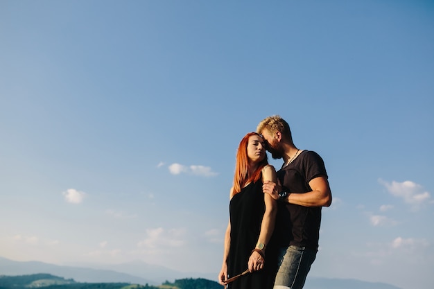 Man embracing his girlfriend