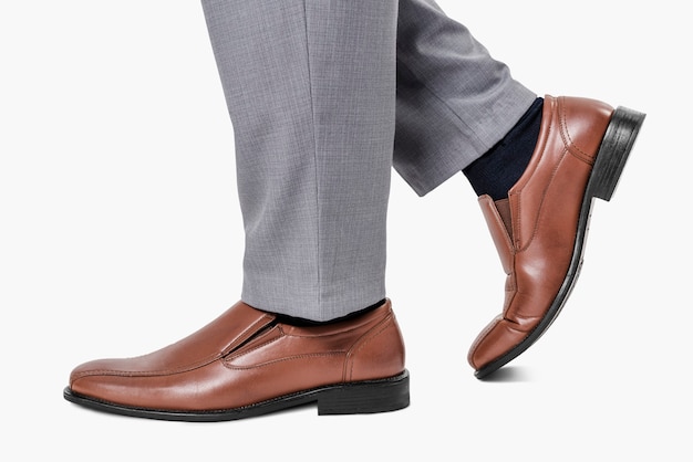 Free photo man wearing brown leather loafer shoes