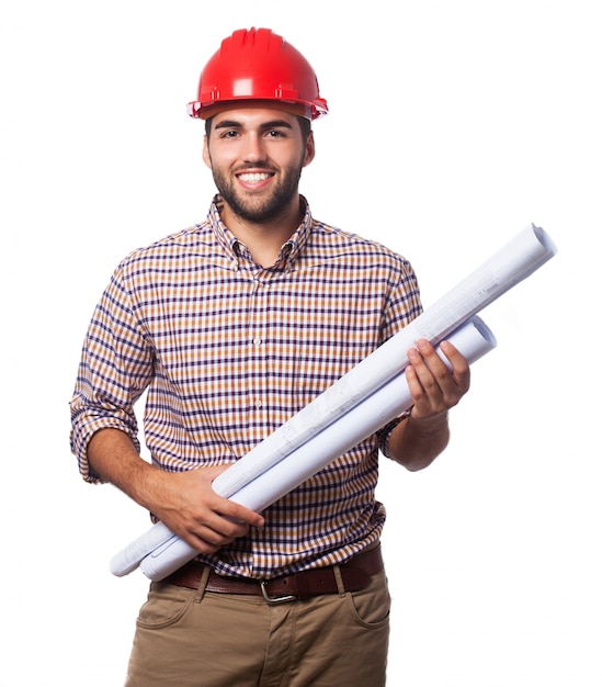 Man with blueprints and helmet