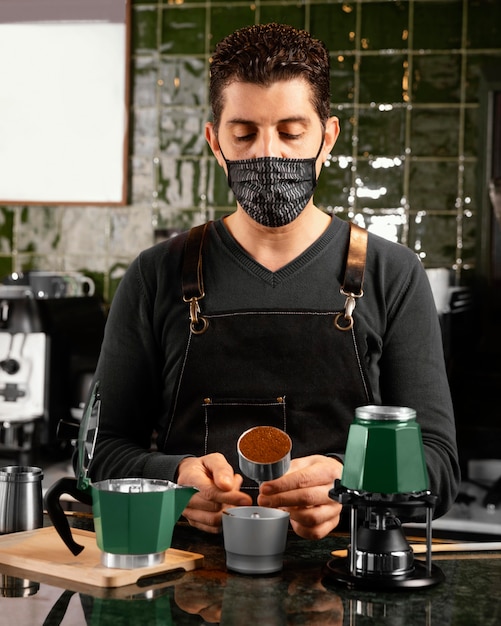 Medium shot barista preparing coffee