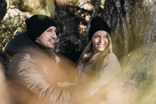 Free photo medium shot smiley couple in nature