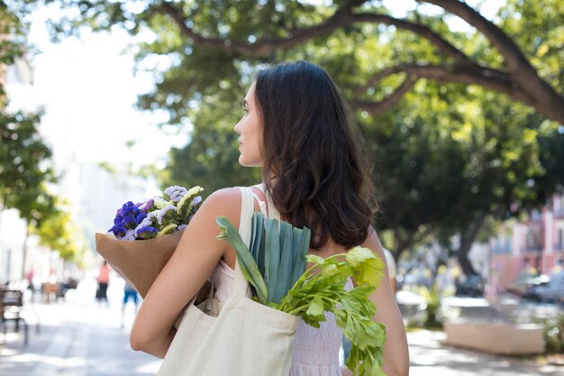 Medium shot woman with eco bag