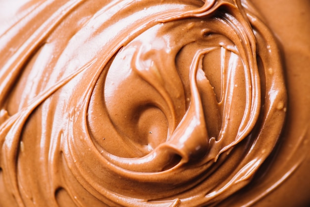 Free photo melted chocolate swirl background