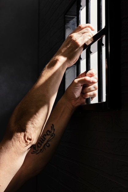 Free Photo middle aged man spending time in jail