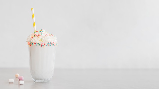 Free Photo milkshake frame with white background