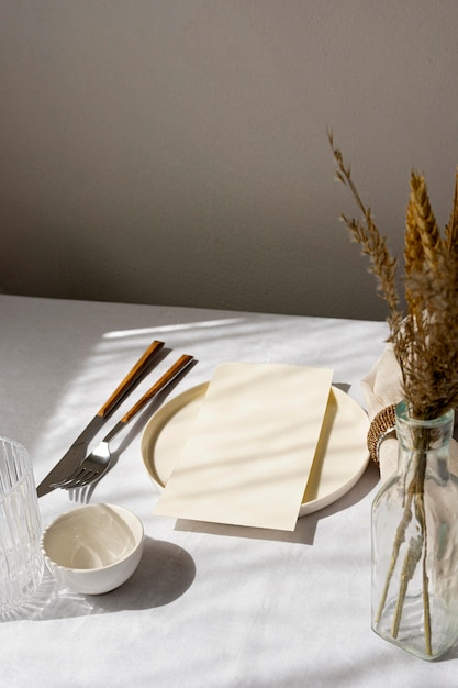 Free photo minimal white table arrangement