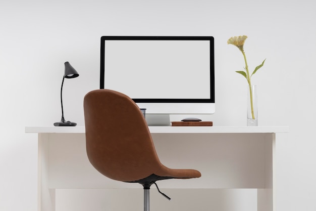 Free Photo minimalistic business desk concept with monitor