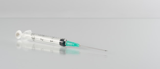 Free Photo minimalistic science banner with syringe