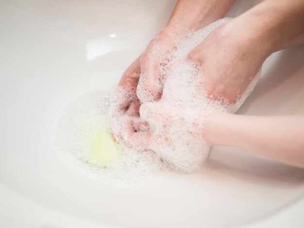 Mom and son washing hands