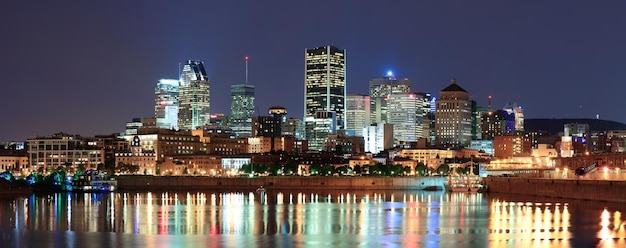 Free photo montreal over river at dusk