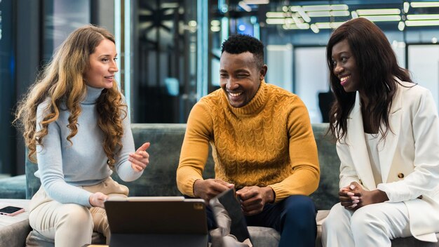 Multiracial group of people discussing business in an office