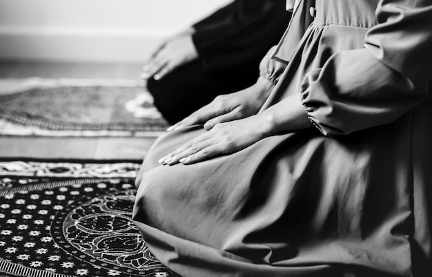 Free photo muslim praying in tashahhud posture