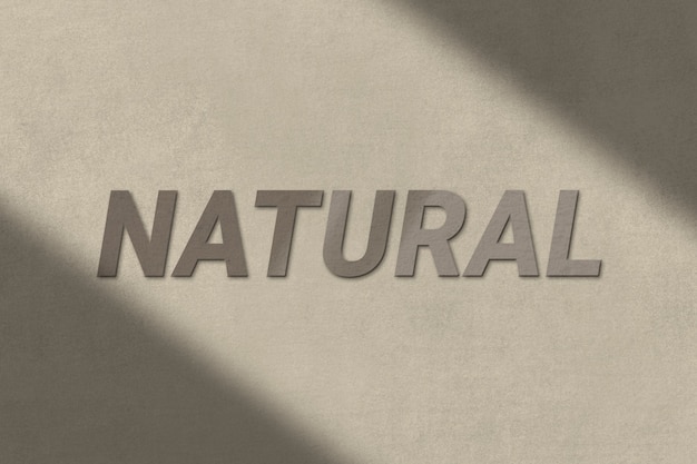 Free photo natural text in brown concrete textured font