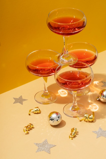 Free photo new year party arrangement with glasses and drinks