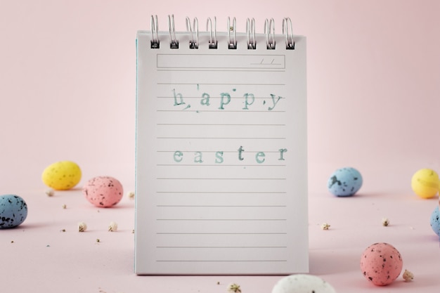 Free Photo notepad paper with beautiful easter greeting