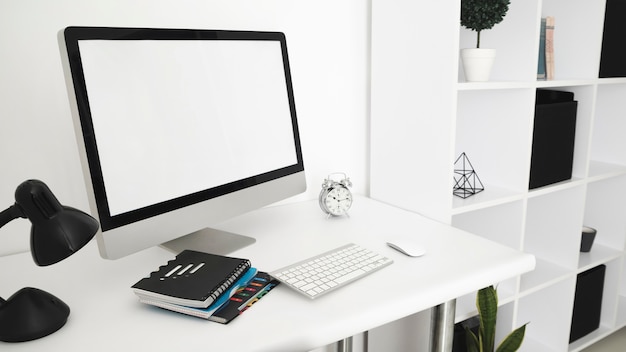 Free Photo office desk with computer screen