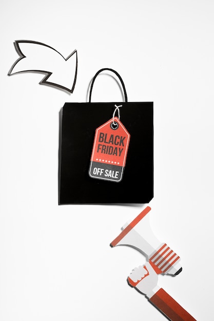 Free photo paper megaphone and shopping bag with label